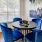 a room with a table and chairs