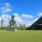 a statue in a grassy field