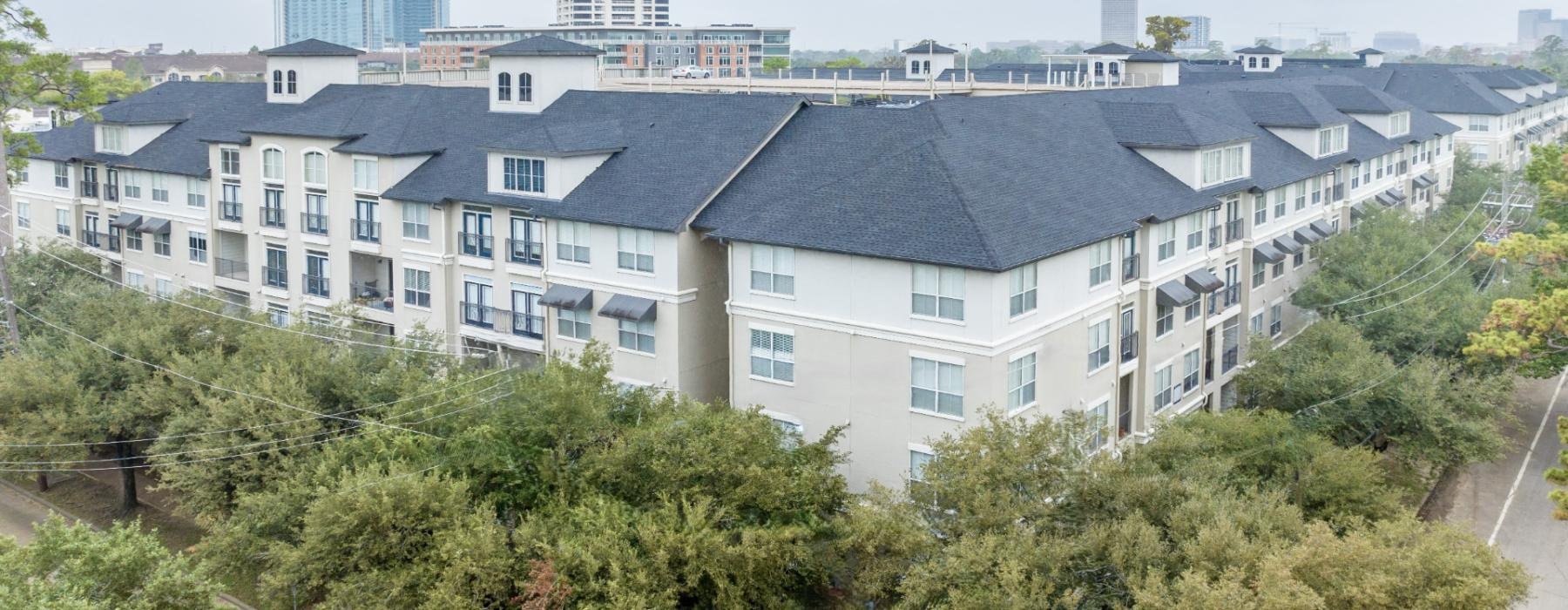 a building with trees in front of it