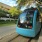 a blue and white tram