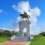 a statue of a person riding a horse on a pedestal