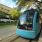 a blue and white tram