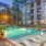 a swimming pool in front of a building