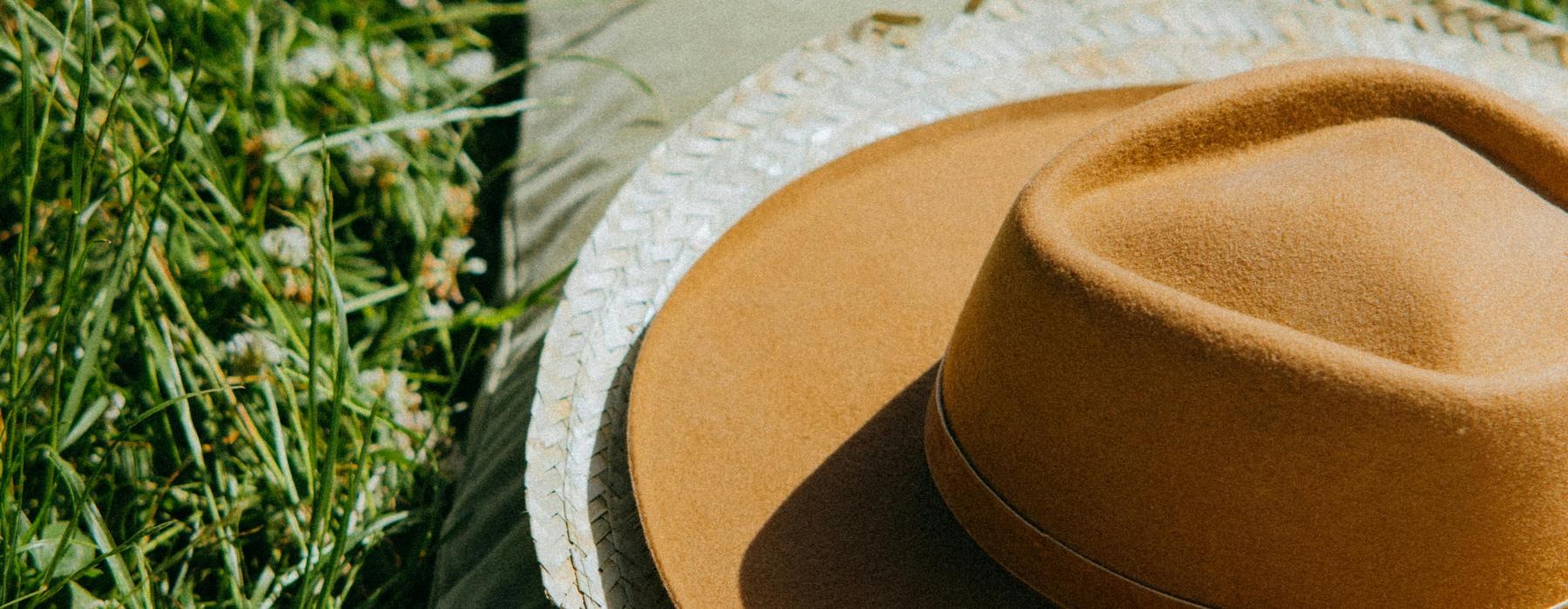 a pair of hats on a blanket