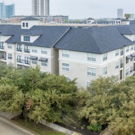 Find your perfect fit at Plaza Museum District a building with trees in front of it